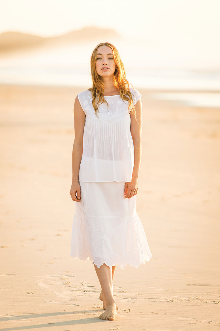 Woman walking on beach