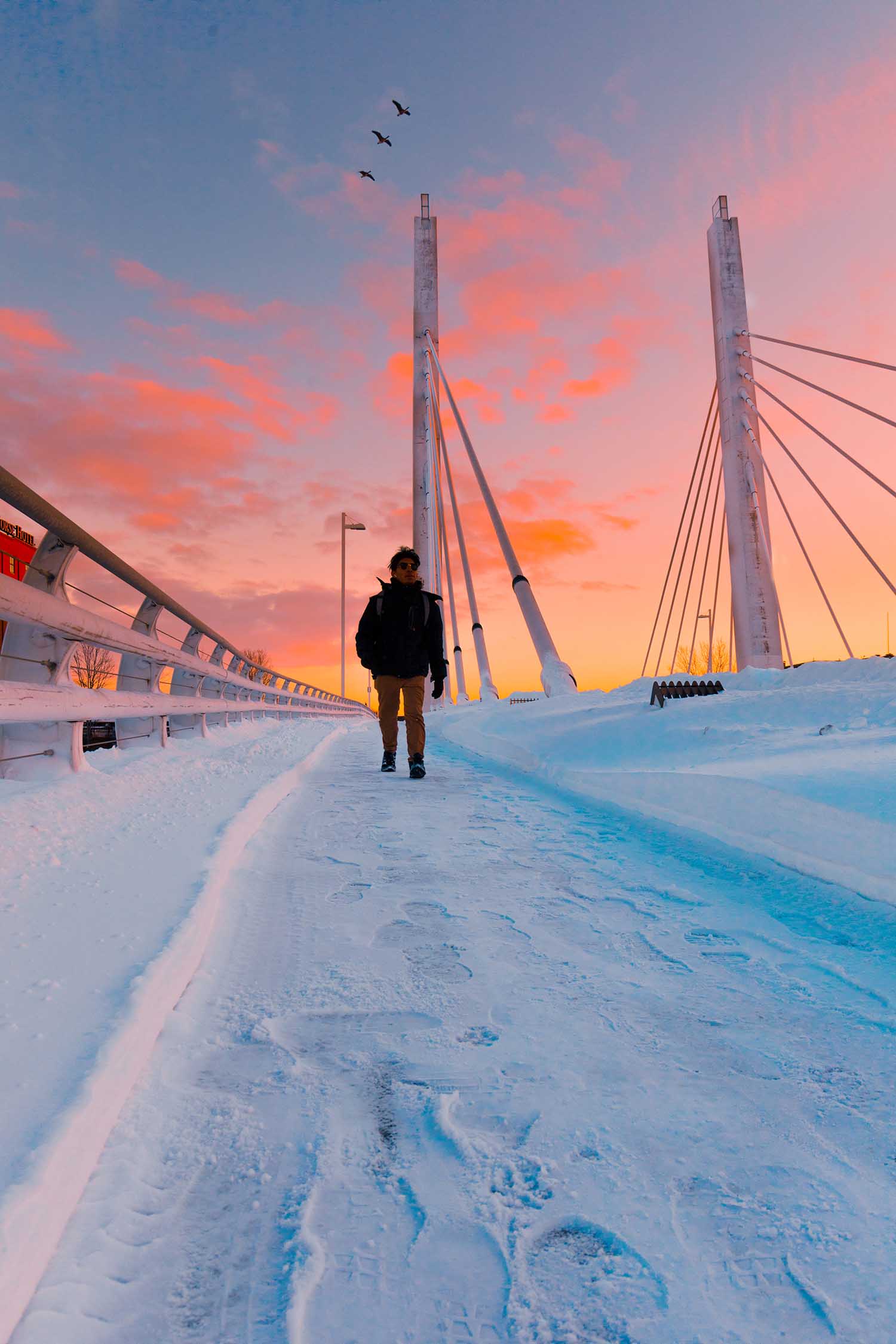 person standing infront of sunset