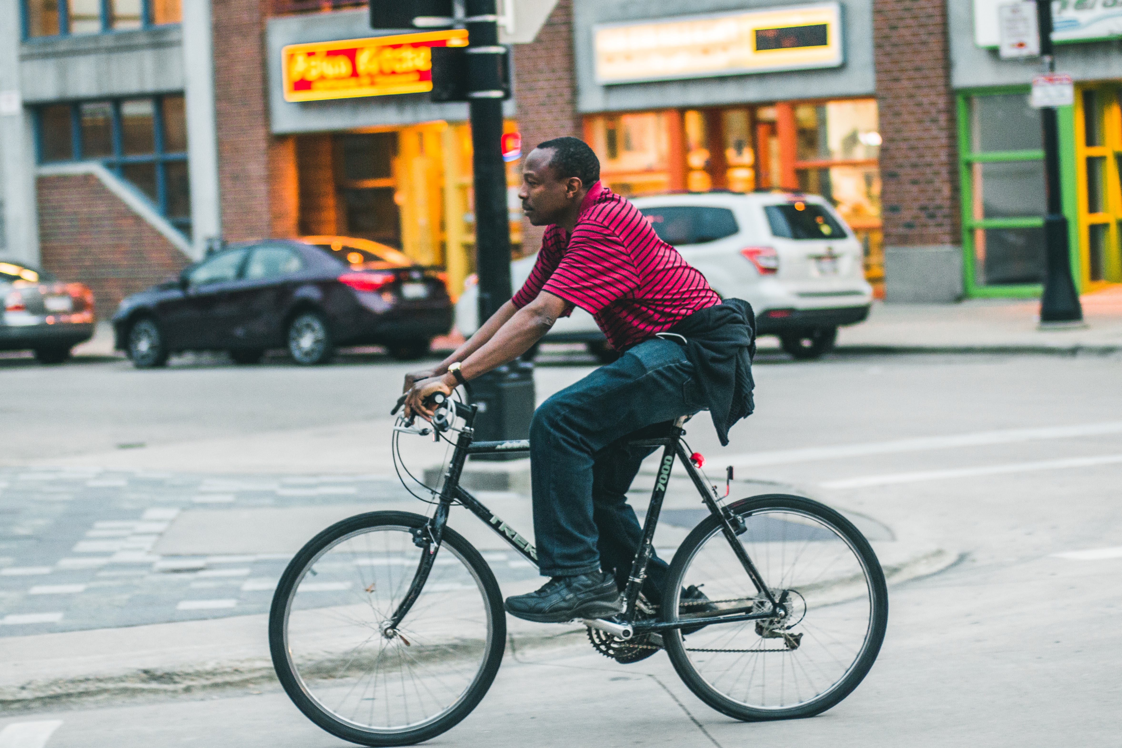 Person Riding bike STreet Photo