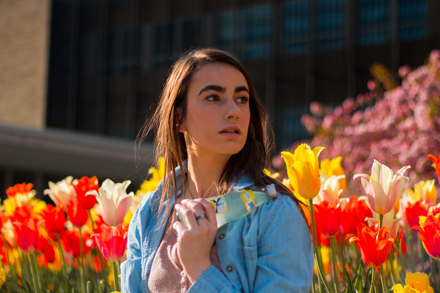 Model holding sparkling water