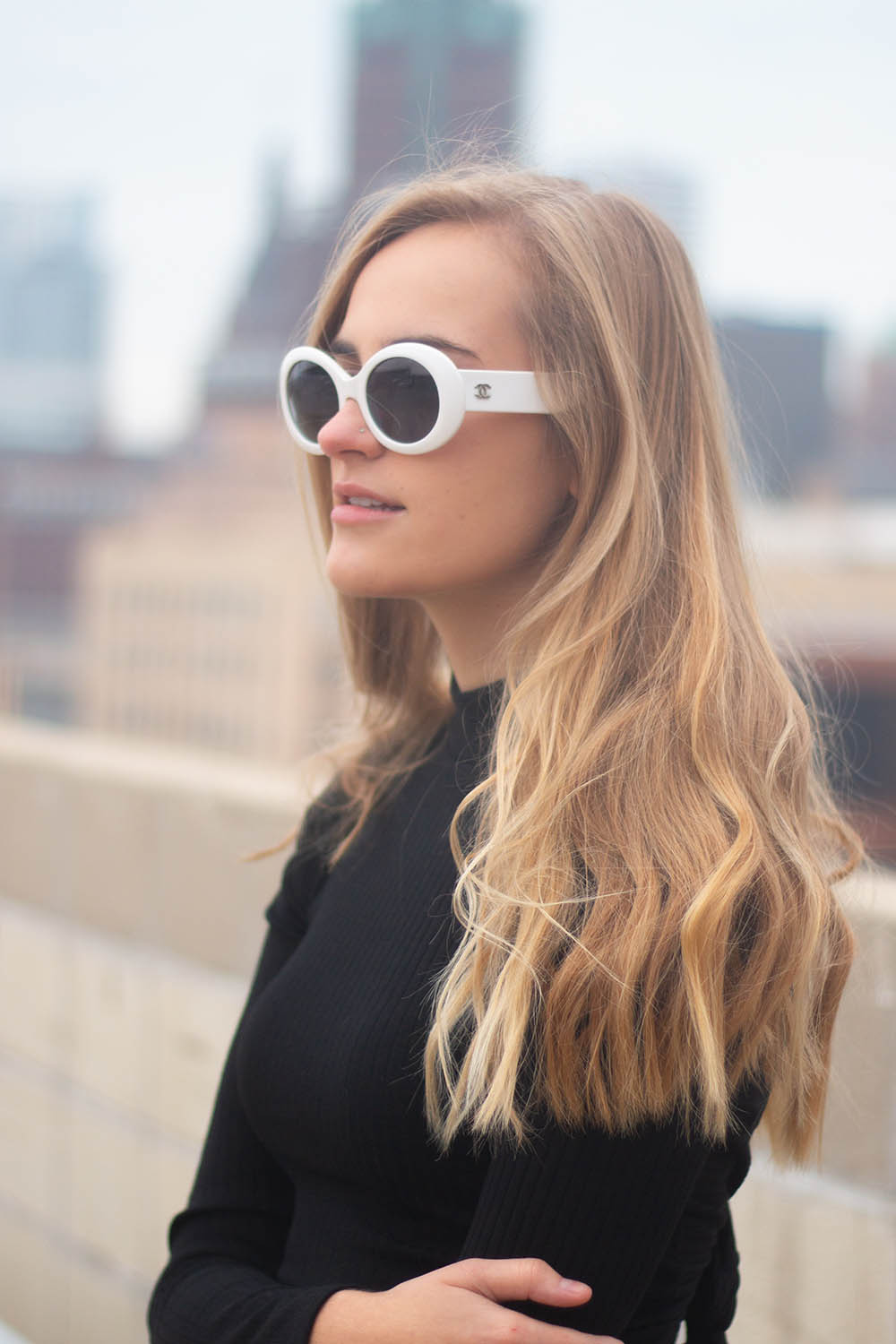 Model wearing Channel vintage sunglasses Milwaukee Wisconsin for product photoshoot